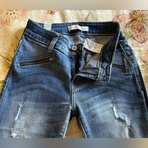 Skinny blue jeans with front and side leg zipper